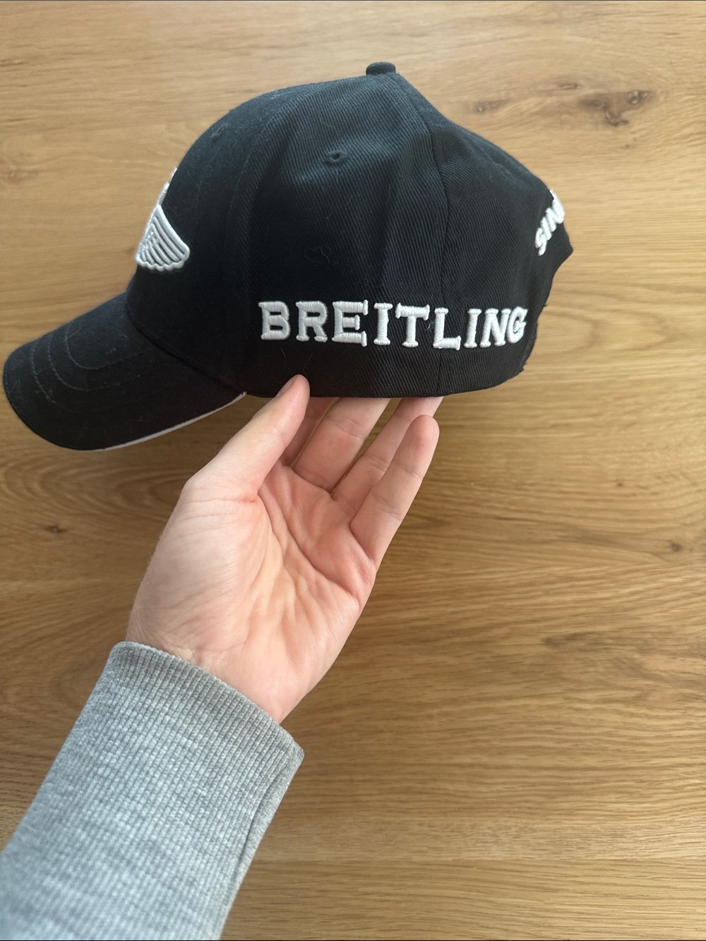Breitling Black Baseball Cap with White Winged Anchor Emblem - Picture 2 of 4